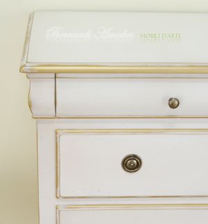 Classic wooden chest of drawers with lacquered finish